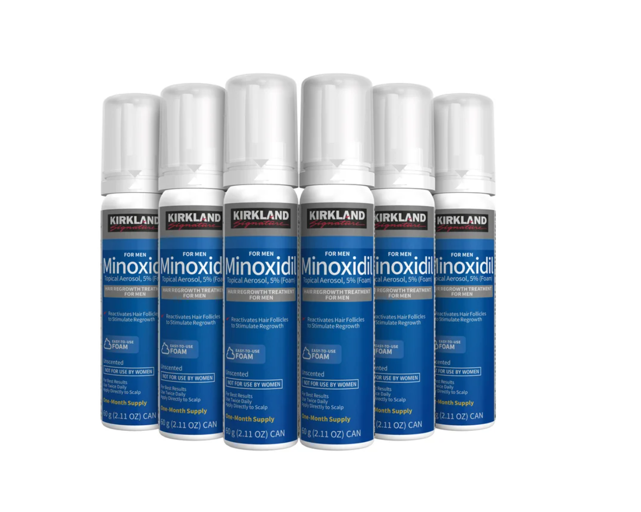 Six Kirkland Minoxidil Foam bottles on a white background