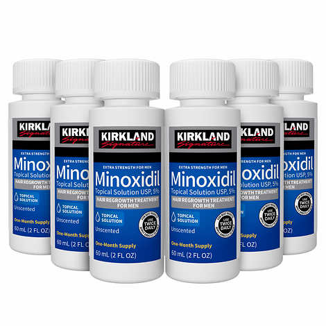 Kirkland Minoxidil bottles on a white background